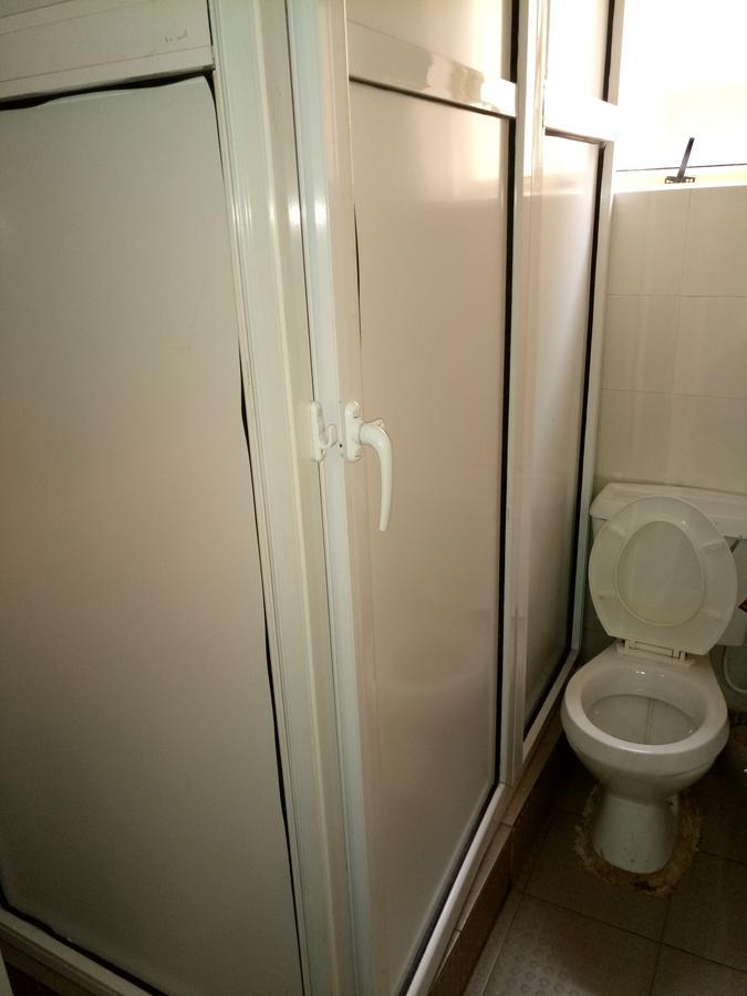Hotel Benizia Asaba Bagian luar foto