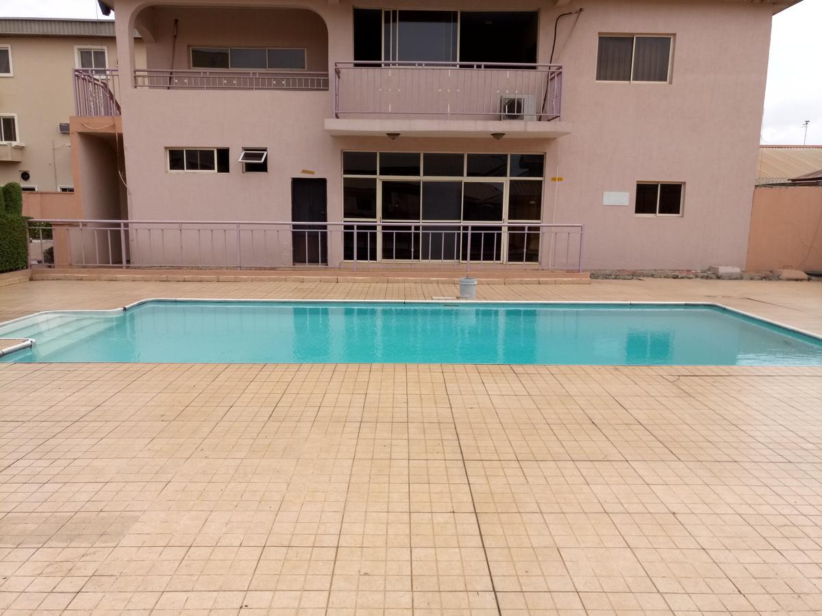 Hotel Benizia Asaba Bagian luar foto