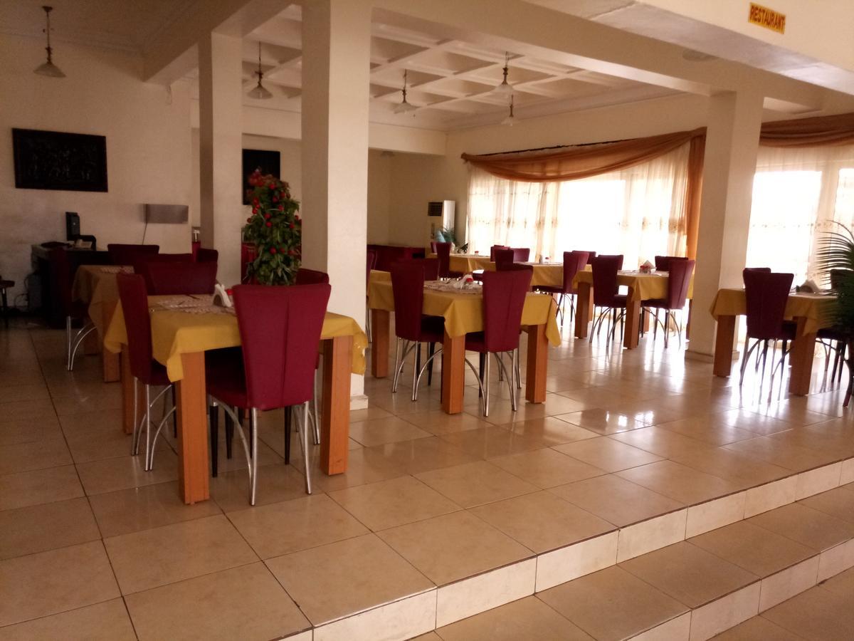 Hotel Benizia Asaba Bagian luar foto
